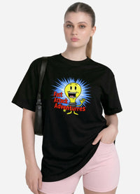 Woman wearing the black Fact Attack Adventures graphic tee